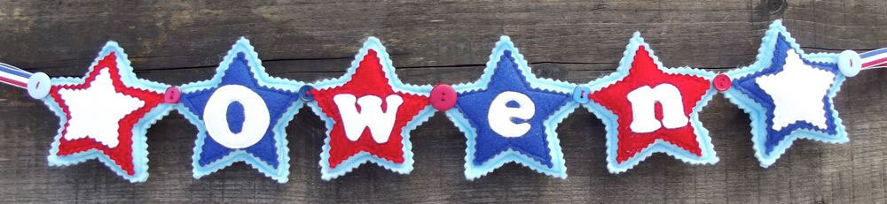 Star Name Banner in Blue, Red & White. £12 for up to four letters, each additional letter is £2. This one is priced at £16 due to the additional star at either end. Each shape is 3½ inches tall and usually the same width. These can be done in any combination of colours. Star Name Banner in Blue, Red & White. £12 for up to four letters, each additional letter is £2. This one is priced at £16 due to the additional star at either end. Each shape is 3½ inches tall and usually the same width. These can be done in any combination of colours.