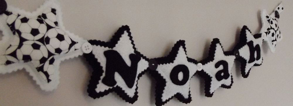 Star Name Banner in Black, White & Football Fabric. £12 for up to four letters, each additional letter is £2. This one is priced at £16 due to the additional star at either end. Each shape is 3½ inches tall and usually the same width. These can be done in any combination of colours. Star Name Banner in Black, White & Football Fabric. £12 for up to four letters, each additional letter is £2. This one is priced at £16 due to the additional star at either end. Each shape is 3½ inches tall and usually the same width. These can be done in any combination of colours.