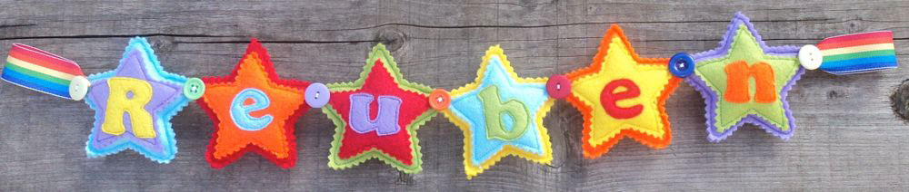 Star Name Banner in Rainbow Colours. £12 for up to four letters, each additional letter is £2. This one is priced at £16. Each shape is 3½ inches tall and usually the same width. These can be done in any combination of colours. Star Name Banner in Rainbow Colours. £12 for up to four letters, each additional letter is £2. This one is priced at £16. Each shape is 3½ inches tall and usually the same width. These can be done in any combination of colours.