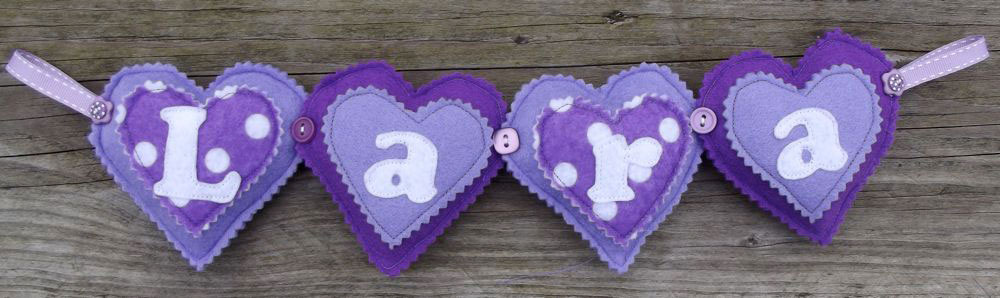 Heart Name Banner in Purple £12 for up to four letters, each additional letter is £2. This one is priced at £12. Each shape is 3½ inches tall and usually the same width. These can be done in any combination of colours, Pink is the most popular colour with this item. Heart Name Banner in Purple £12 for up to four letters, each additional letter is £2. This one is priced at £12. Each shape is 3½ inches tall and usually the same width. These can be done in any combination of colours, Pink is the most popular colour with this item.